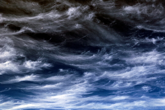 Blue sky with light white cirrus clouds © sidneydealmeida