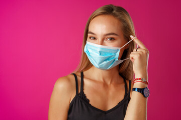 Young beautiful casual woman wearing protective medical mask