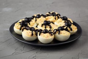 Deviled Eggs With A Spider For Halloween Party.