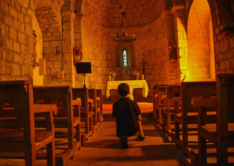 ROCABRUNA, CATALONIA, SPAIN, EUROPE, SEPTEMBER 2020. Interior of the 12th century Romanesque church...