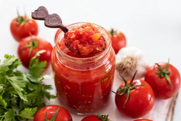 Canned tomato sauce, prepared at home.Harvesting for the winter.