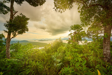 Aerial View of ranong hill for seascape with sunset rays through the cloud