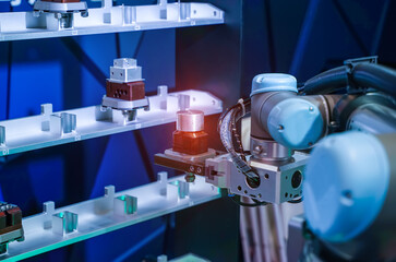 robotic arm catch for electronic assembly line. The robot for smart technology manufacturing process.