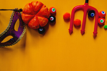 Halloween house decorations,Pumpkin toys on a yellow background.