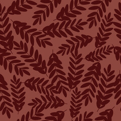 Vector seamless pattern with foliage in a red background.