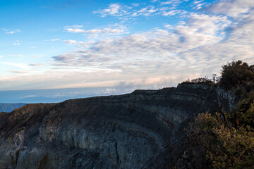 sunrise in the mountains, Kawah Ijien volcano, cliff of the rocky mountain