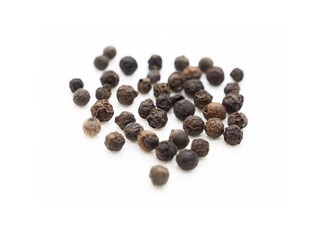 Black pepper, herbs, spices in top view.