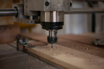 CNC drilling machine. Drill work on wood. 