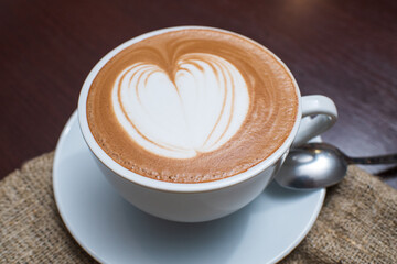 Delicious, aromatic and freshly made cappuccino with a pattern