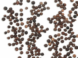 Black pepper background, herbs, spices in top view.