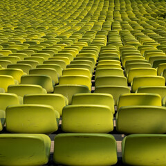 Obraz premium endless rows of enpty chairs in a stadium