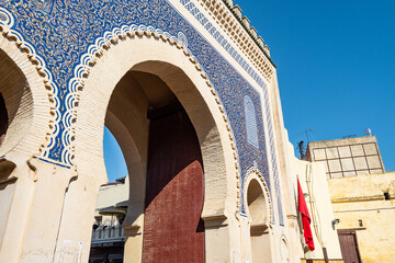 Fez, Morocco - June 25, 2019: View of the famous historic Bab Bou Jeloud gate. Is an ornate city...