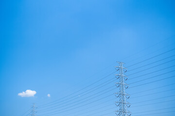 blue clear sky and small cloud with high voltage electric pole