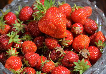 Freshly picked strawberries in crystal platter