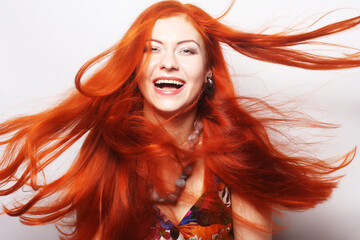 woman with long flowing red hair