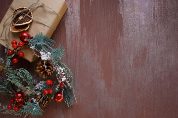 brown with hoarfrost christmas background with gift and decor