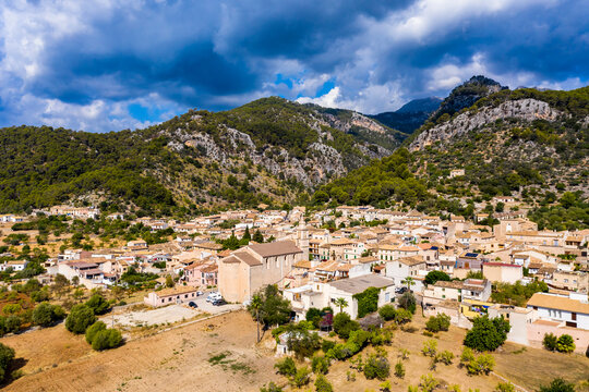 Aerial view, the village of Caimari municipality of Selva on the edge of the Tramuntana mountains with agriculture, center of the island, Mallorca, Balearic Islands, Spain