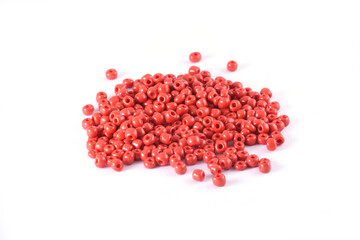 Beads spread on white background. Background or texture of beads. Close up, macro,It is used in finishing fashion clothes. make bead necklace or beads for woman of fashion,Bead Crochet. Daily Beading.
