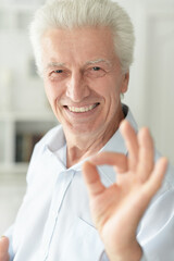 Good old man showing ok at homen
