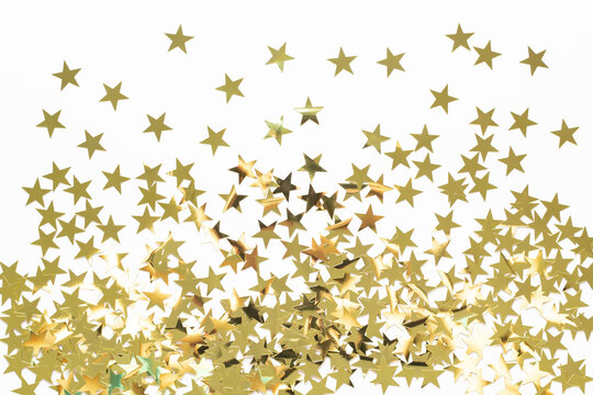 Christmas background with gold star confetti. Holiday background for New Year