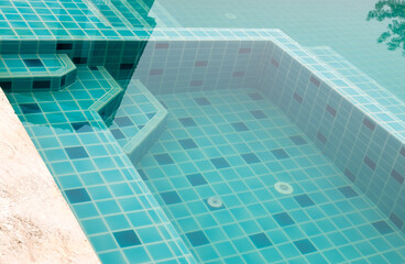 Obraz premium Staircase to the small pool before the large area.