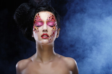 woman with bright artistic make-up