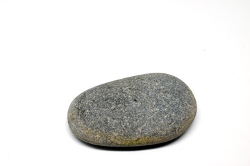 Fototapeta na wymiar Grey sea stone on a white background.