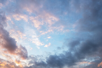 Naklejka na ściany i meble abstract background of cloudy sunset sky golden hour