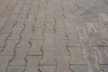 abstract background of tiles on the track in the park close up