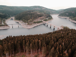 Okertalsperre, Oker Dam aerial view. Reservoir in the forest of the Harz mountains in Lower Saxony, Germany. Harz Germany landscape panorama. 