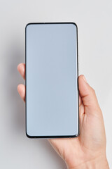 Mock up of smartphone in hand palm