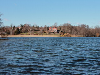 Distant Large House at Silent Blue Lake