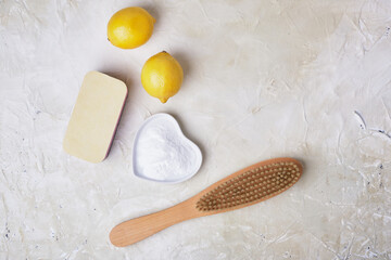soda, lemons, sponge and wooden brush for eco cleaning, natural and non-toxic detergents, zero waste lifestyle concept