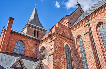 Fototapeta na wymiar Old red brick church in Tartu 