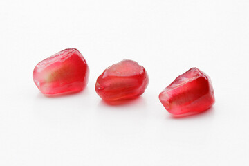 pomegranate seeds red autumn fruit on white background