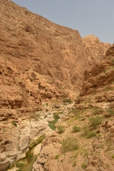 Fototapeta na wymiar The stunning gorges and desert landscape of the Arabian Peninsula in Oman