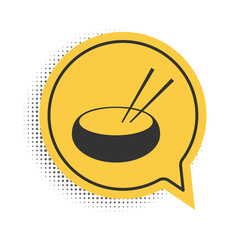 Black Bowl with asian food and pair of chopsticks silhouette icon isolated on white background. Concept of prepare, eastern diet. Yellow speech bubble symbol. Vector.