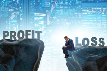 Concept of profit and loss with businessman