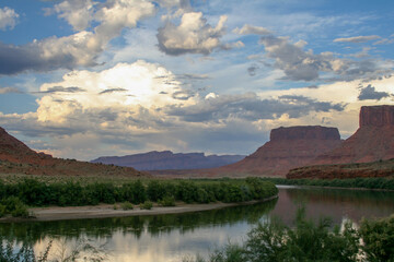 Fototapeta na wymiar Reflections of the Utah skyline in the Colorado River