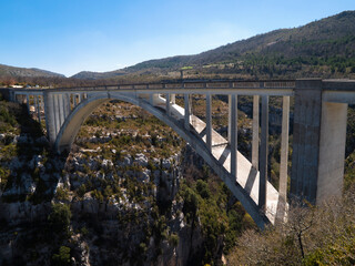 Fototapeta na wymiar Pont de l'Artuby bridge near the Verdon Gorge (Gorges du Verdon), a river canyon in Cote d'Azur, Provence, France