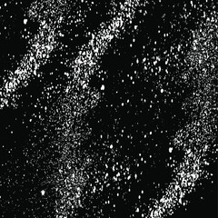 Small uneven spots and particles of debris. Abstract vector texture. Distressed uneven background. Grunge texture overlay with fine grains isolated on white background. Vector illustration. EPS10.