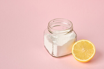 can of soda and lemon on pink background copy space, eco friendly cleaning supplies concept, baking ingredients
