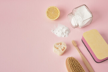 Eco friendly natural cleaning tools and products on pink background , Zero waste cleaning concept....