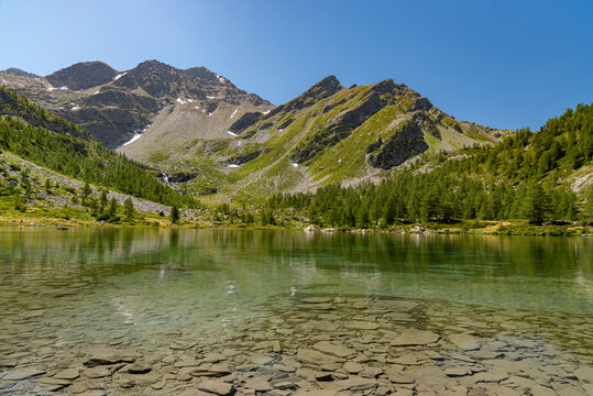 Morgex (Aosta), the wonderful Lake of Arpy, a mirror of water of glacial origin set in a beautiful alpine setting.
