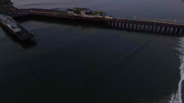 Birds fly over Stearns Wharf in Santa Barbara