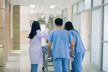 Medical team working in rush to take emergency patient to operation