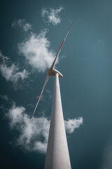 Wind park with wind turbines in the german countryside with fields and sunny weather. Wind creating...