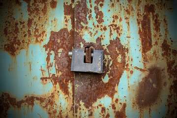 old rusty gates with padlocks
