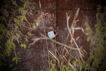 old rusty gates with padlocks