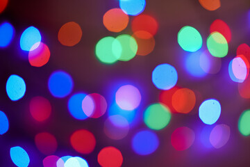 Colorful bokeh of light on black background.